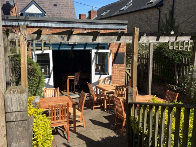The covered decking at the back of the pub