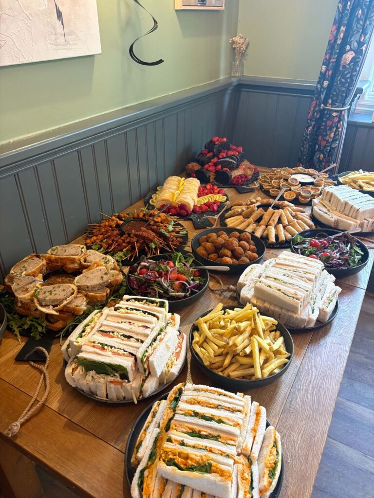 A party buffet laid out in the dining room
